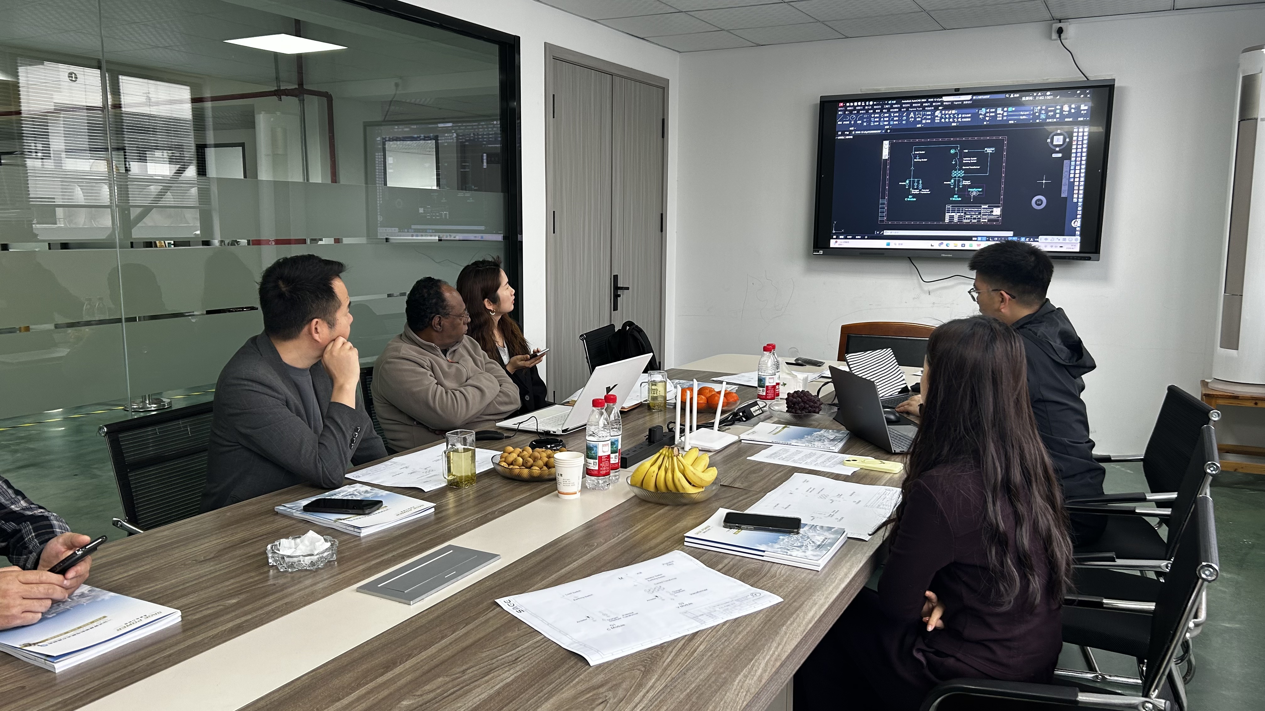 power-project-drawing-discussion-with-kenya-client.jpg